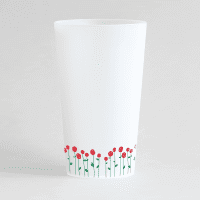 Un ecocup givré de dos avec une frise de roses