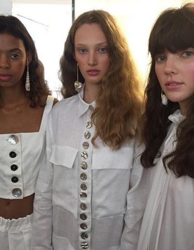 Fashion Week Sydney Australia three models with with soft curl hairstyles and one with a strong hair fringe