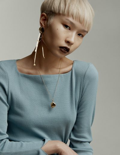 Vogue Australia a girl with a short haircut and bowl straight hairstyle with bleach blonde hair colour on Asian hair