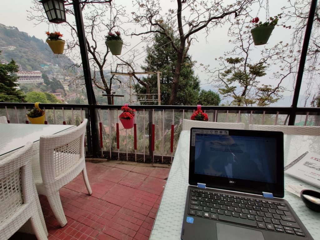 Working from a Cafe in the mountains. Working while traveling. 
