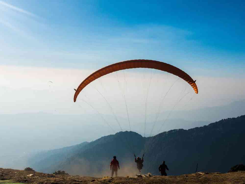 Paragliders on a lovely sunny day in Bir Billing, Himachal Pradesh