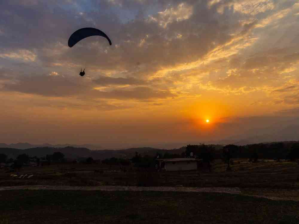 Sunset paragliding