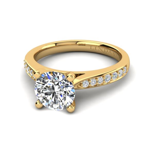 solitaire-engagement-ring-with-side-stone-yellow-gold