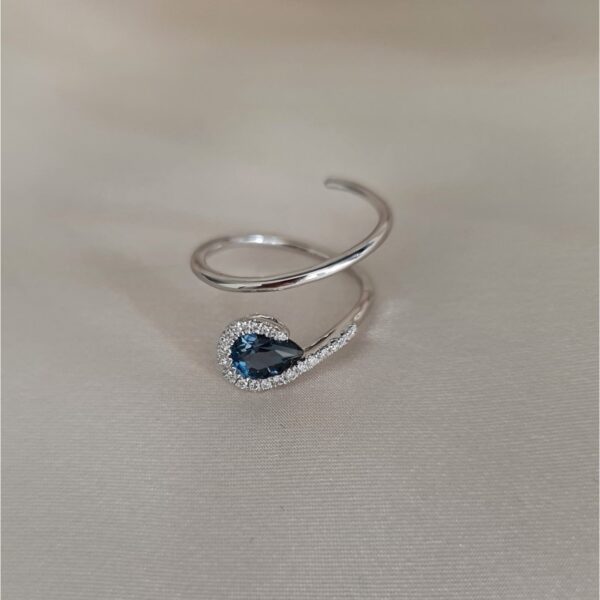 18Ct White Gold Spiral Diamond And London Blue Topaz Dress Ring._1