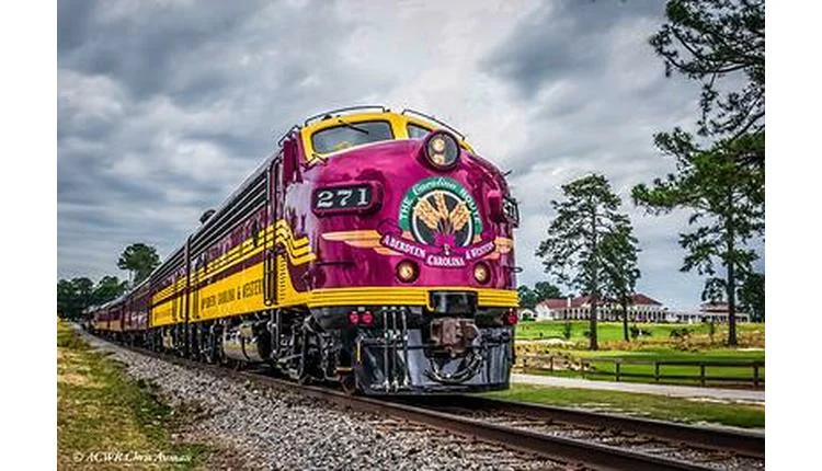 The Magenta Train arrives in Charlotte