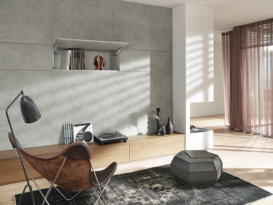 AVENTOS HK top creates discreet storage in living areas.