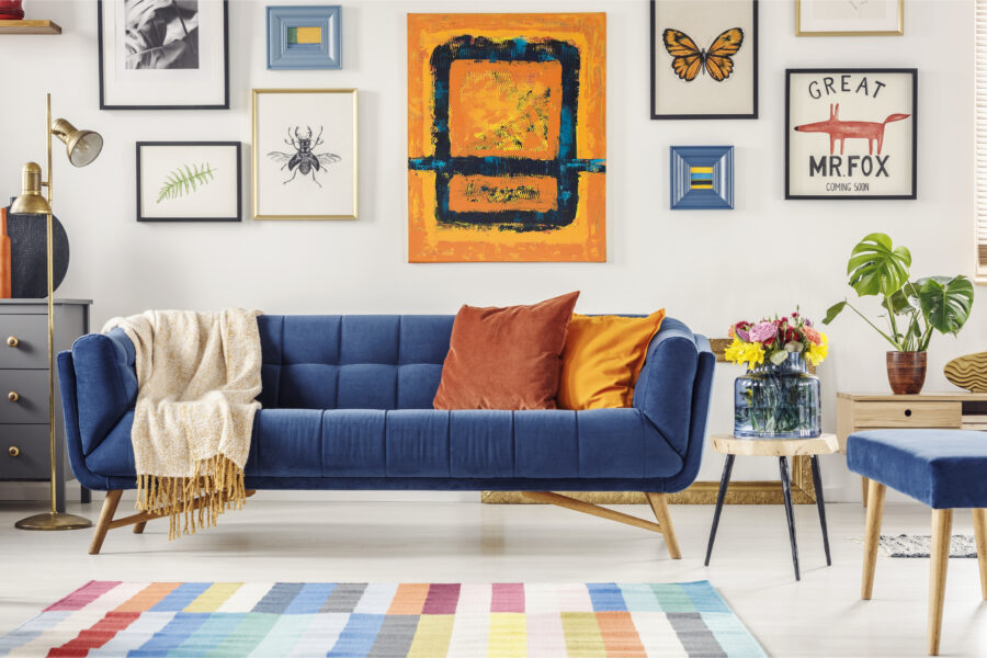 Painting,Above,Navy,Blue,Couch,In,Artistic,Living,Room,Interior