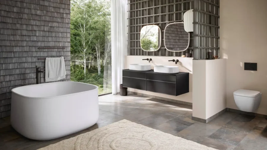 Zencha bathtub by Duravit featuring soft curved lines and a flared rim, inspired by Japanese design aesthetics, shown in a contemporary bathroom setting. (Image source: Duravit AG)