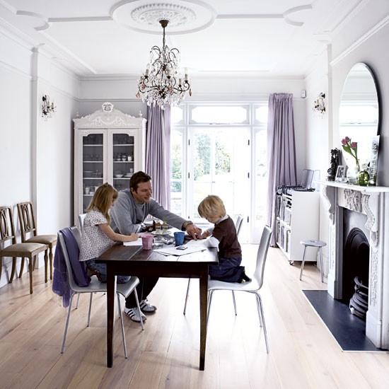 Dining Room wooden floorboards and delicate chandelier