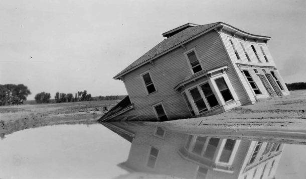 Cambridge, NE Republican R. House in middle of stream. Sitting tilted due to silting in of half of it. Neat picture 2