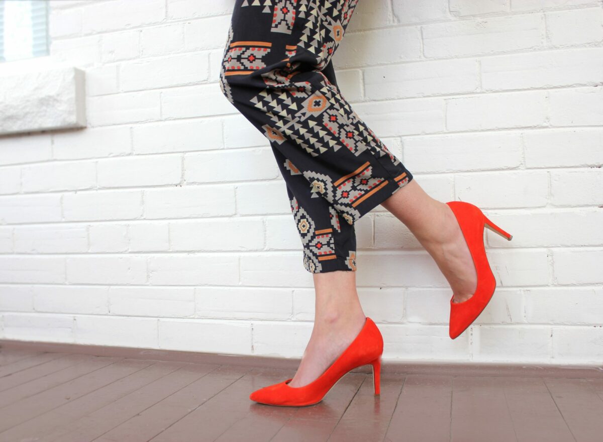 Red Shoes and tribal print pants.