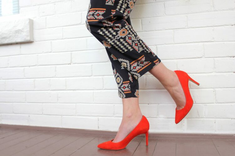 Red Shoes and tribal print pants.