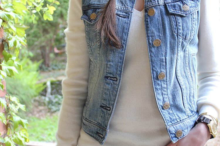 Style Bee in Black pants, white sweater and jean vest.