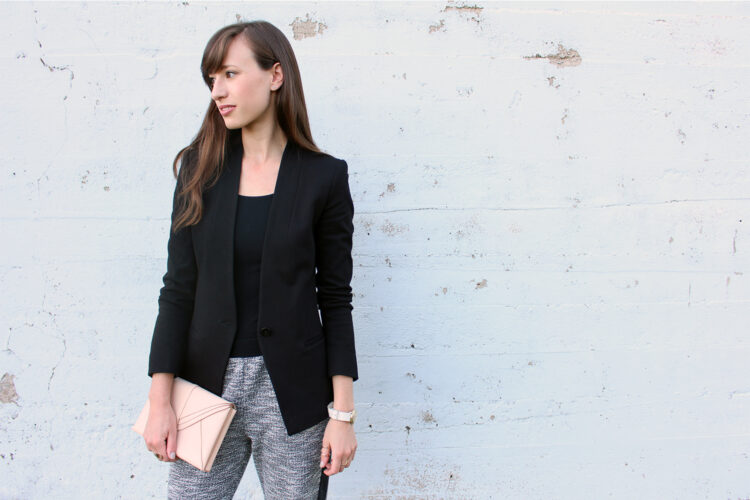 Style Bee wearing a black blazer and tuxedo pants.