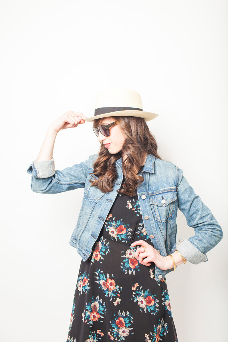 Style Bee in a floral dress and denim jacket.
