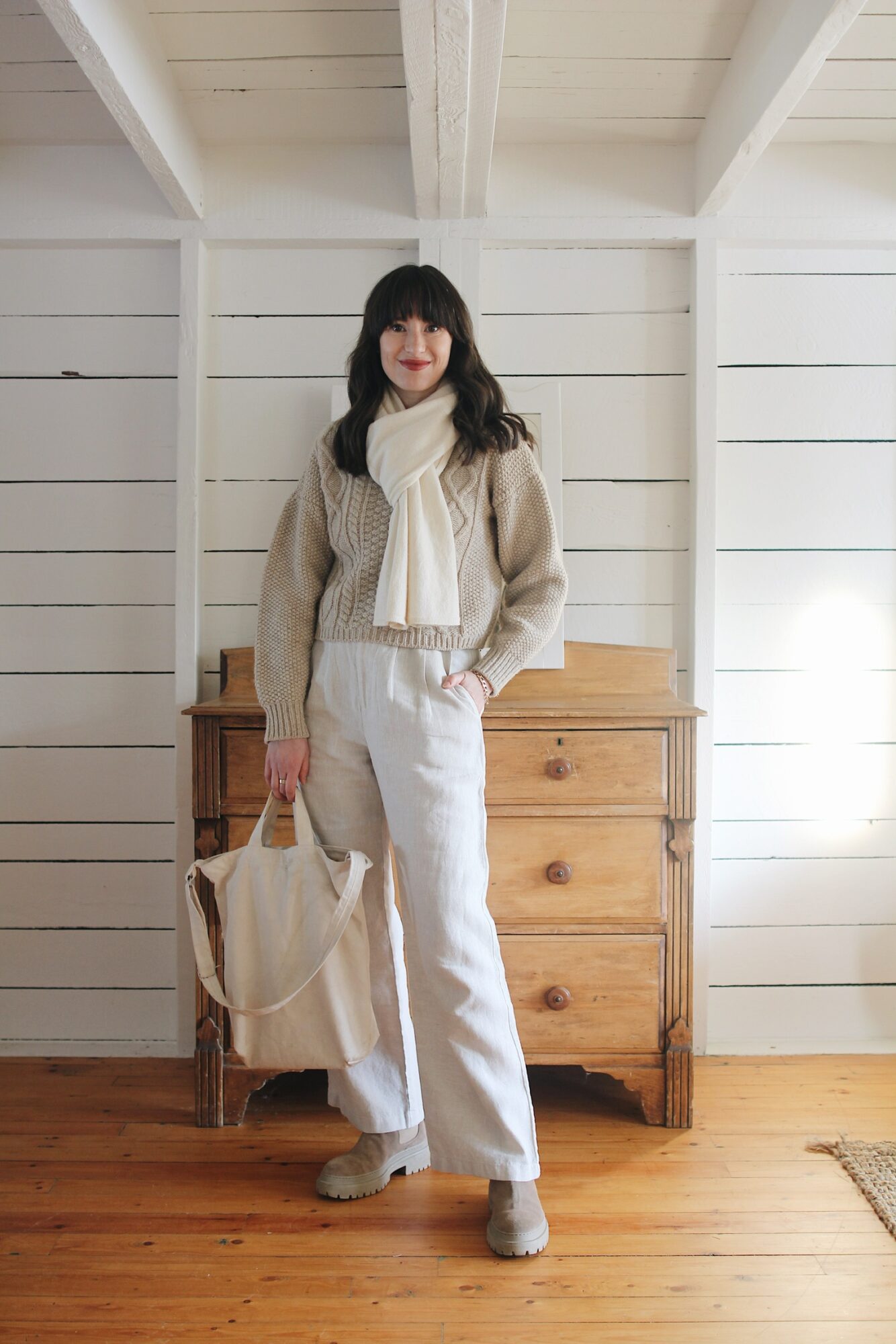 CABLE KNIT SWEATER, LINEN TROUSERS AND SUEDE BOOTS