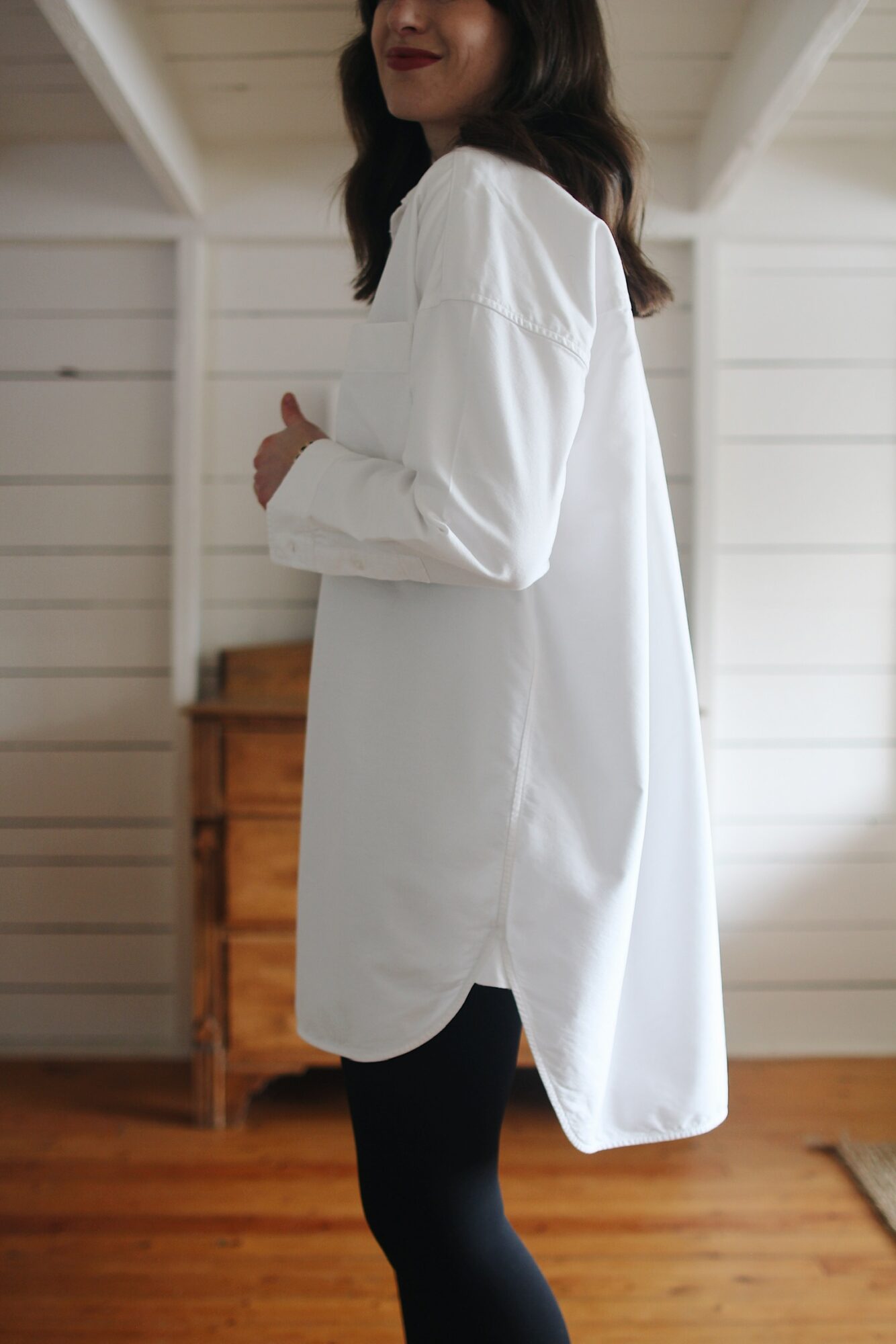 Casual outfit with oversized white shirt and black leggings