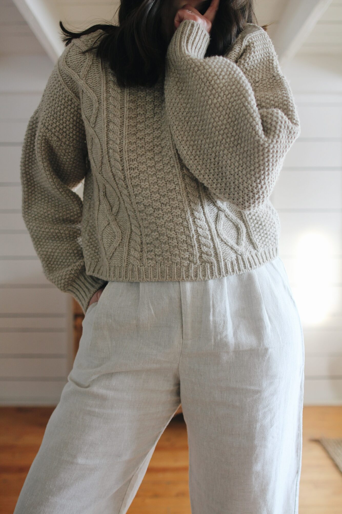 CABLE KNIT SWEATER, LINEN TROUSERS AND SUEDE BOOTS