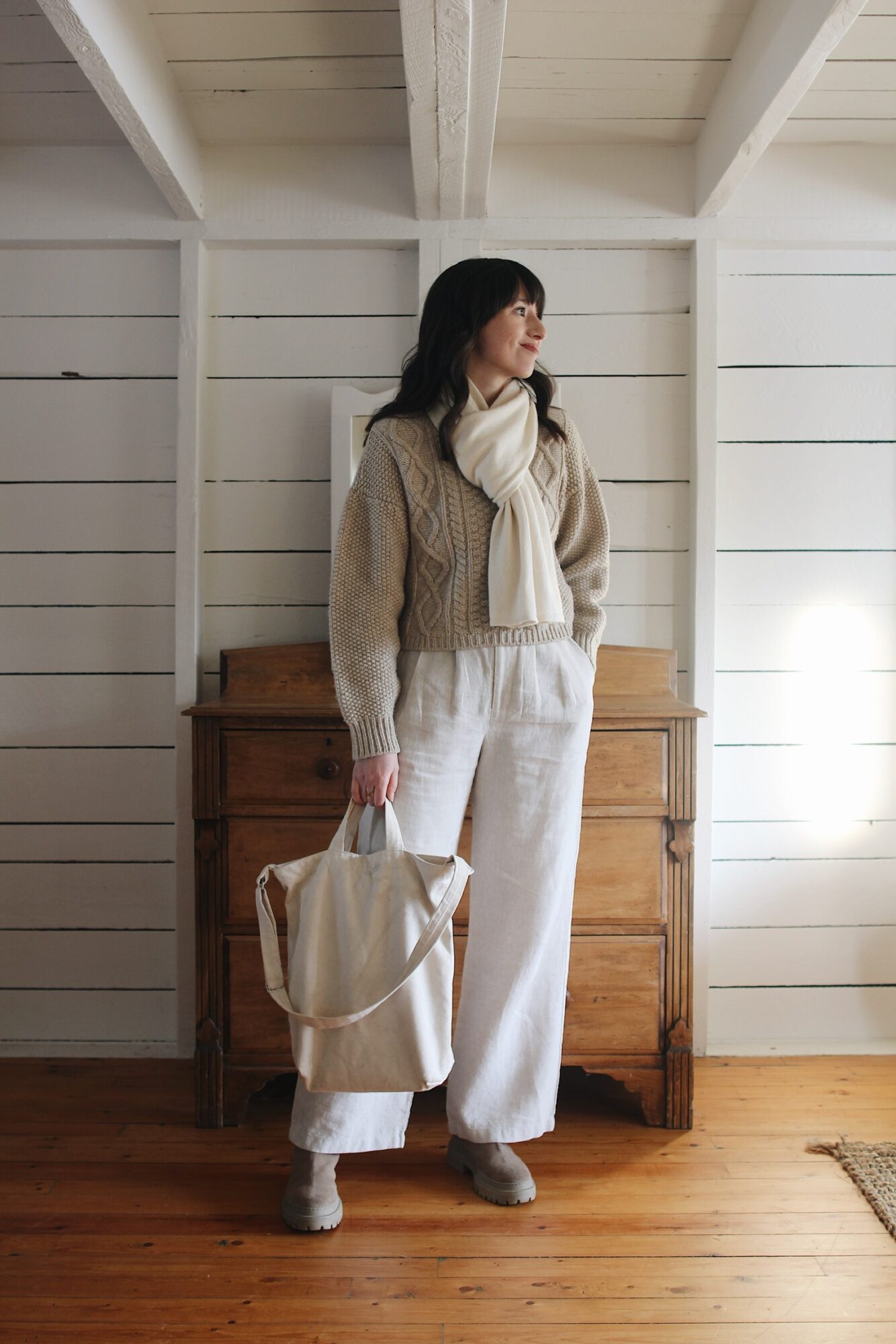 CABLE KNIT SWEATER, LINEN TROUSERS AND SUEDE BOOTS