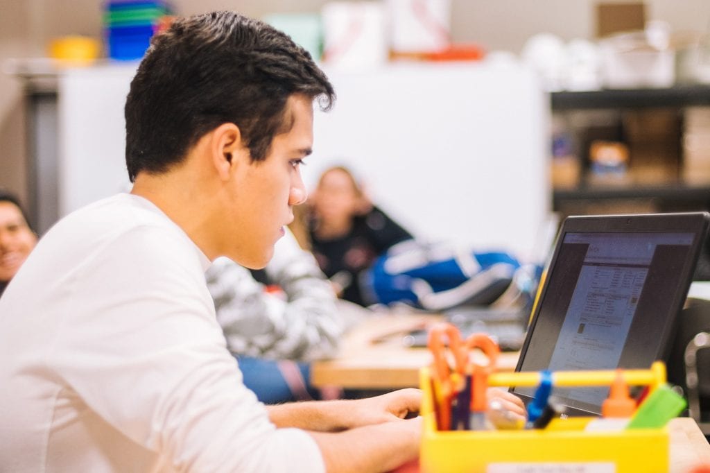 boy-working-at-school