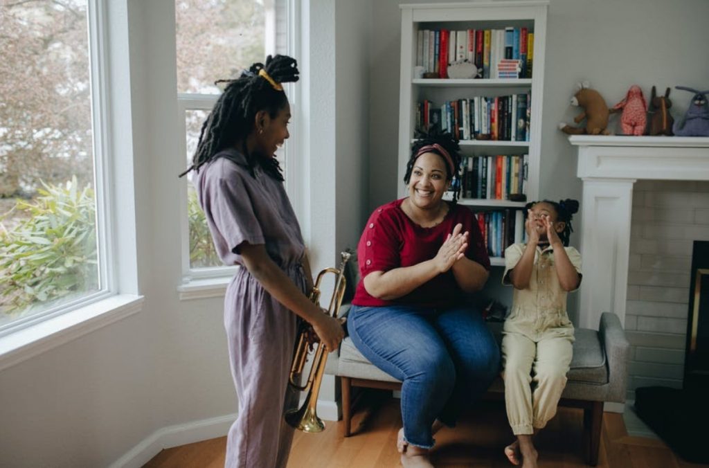 child-playing-musical-instrument