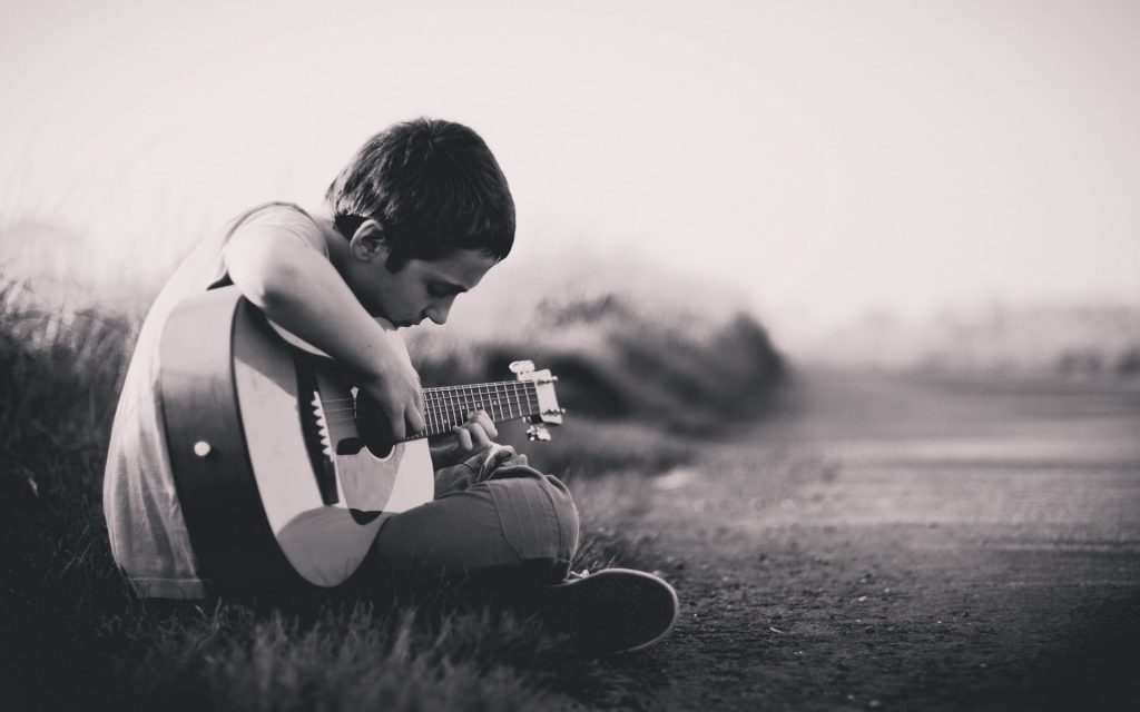 child-playing-guitar