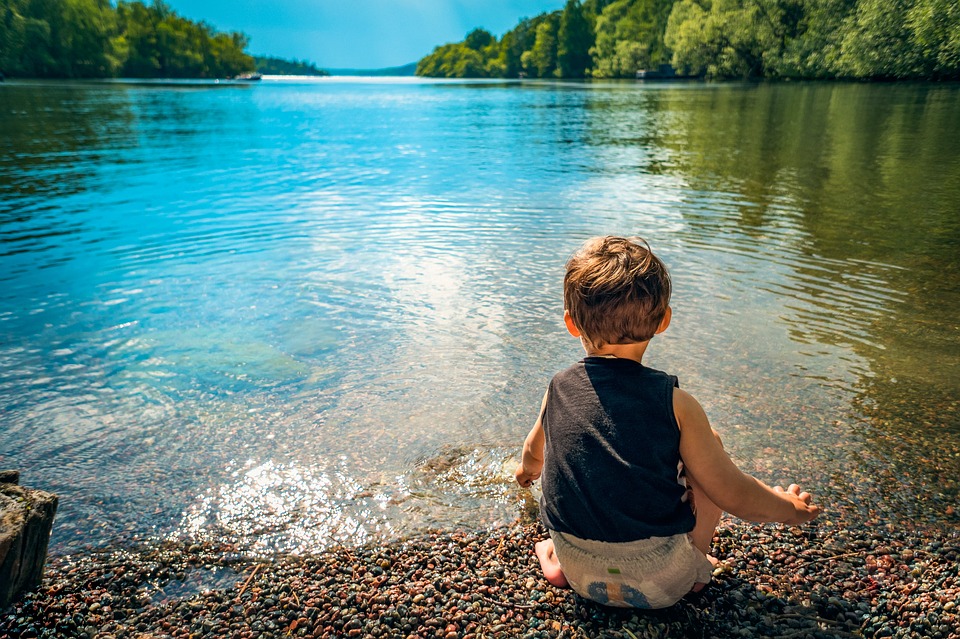 child-by-lake