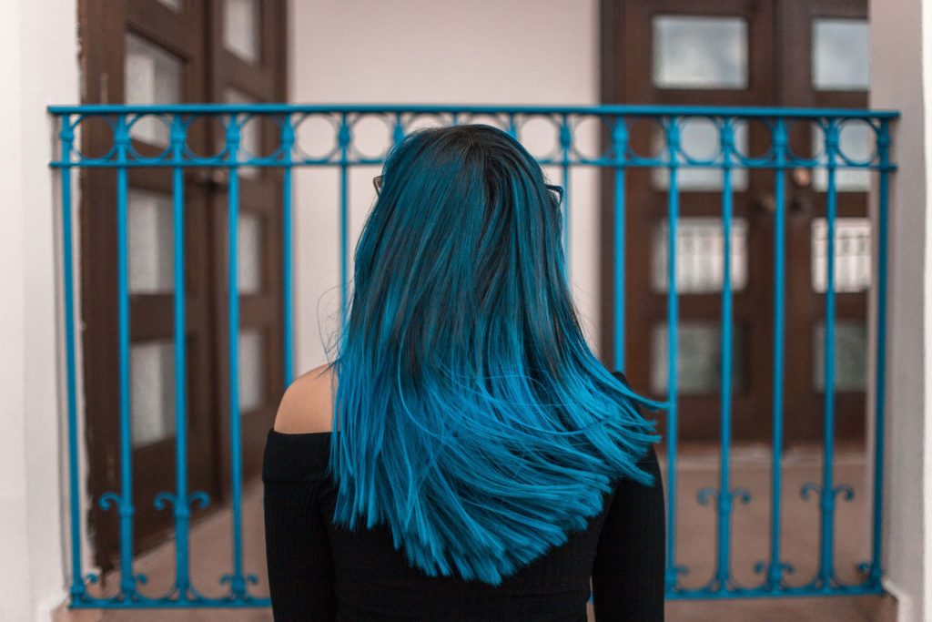 9e0fd97a woman with blue hair