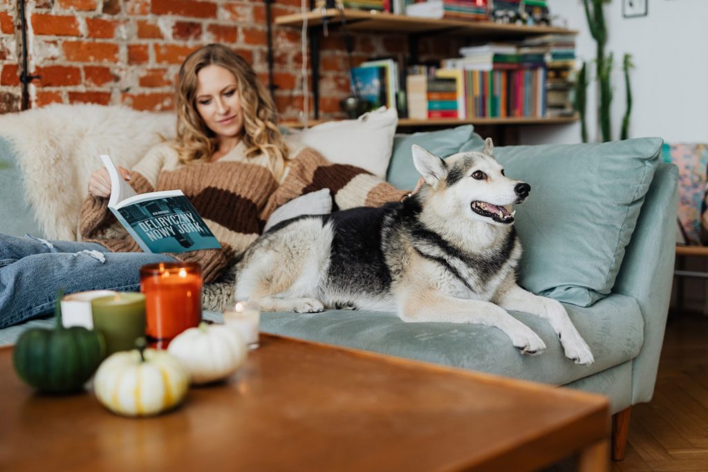 eccce7f4 woman relaxing with dog