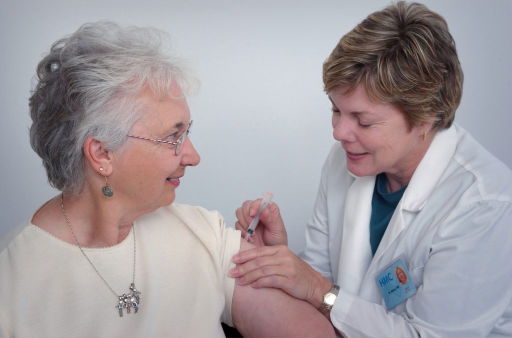 edb doctor giving patient injection