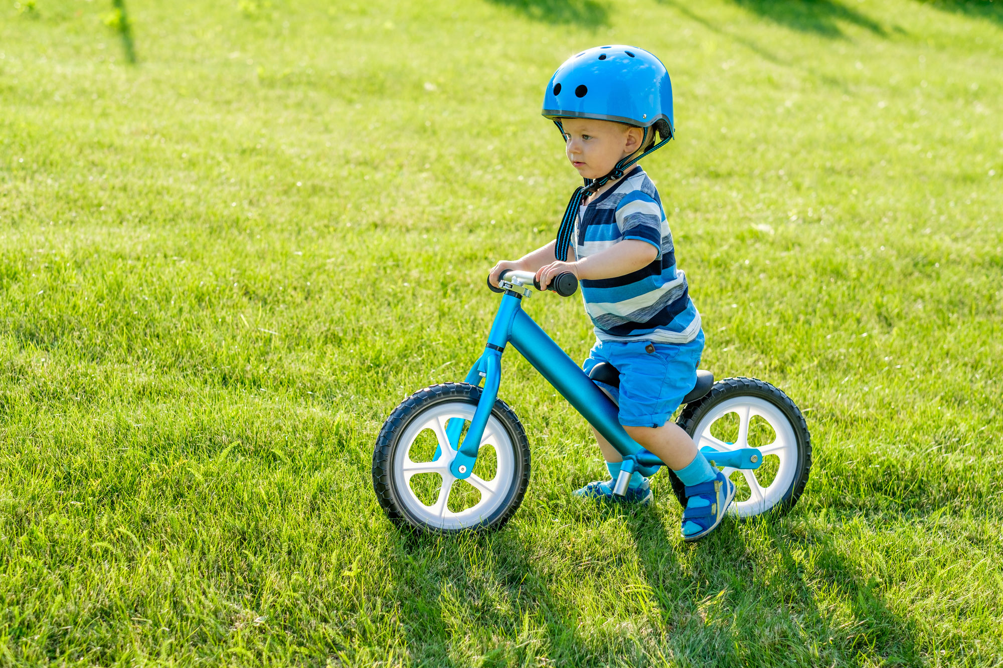 boy on balance bike