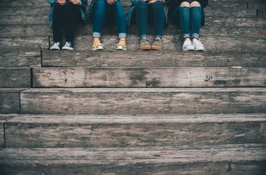 teens sitting on step