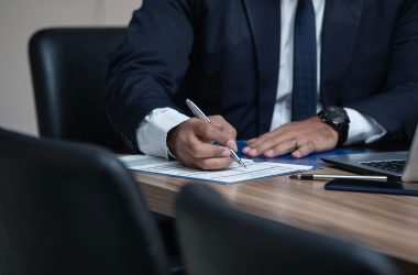 lawyer signing papers