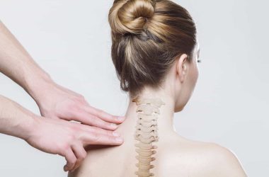 woman with spine graphic showing