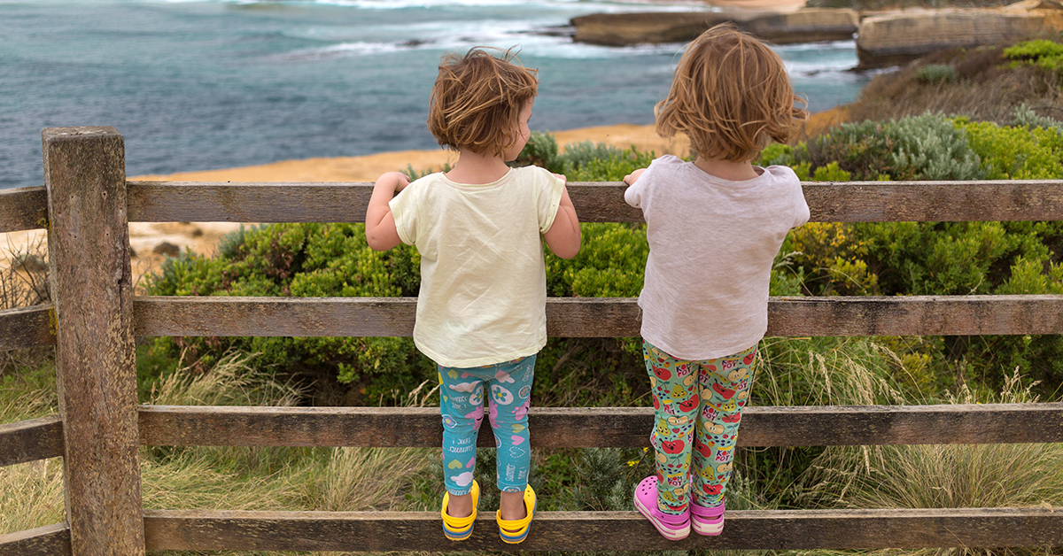 Kids looking at view, Great Ocean Road, Australia