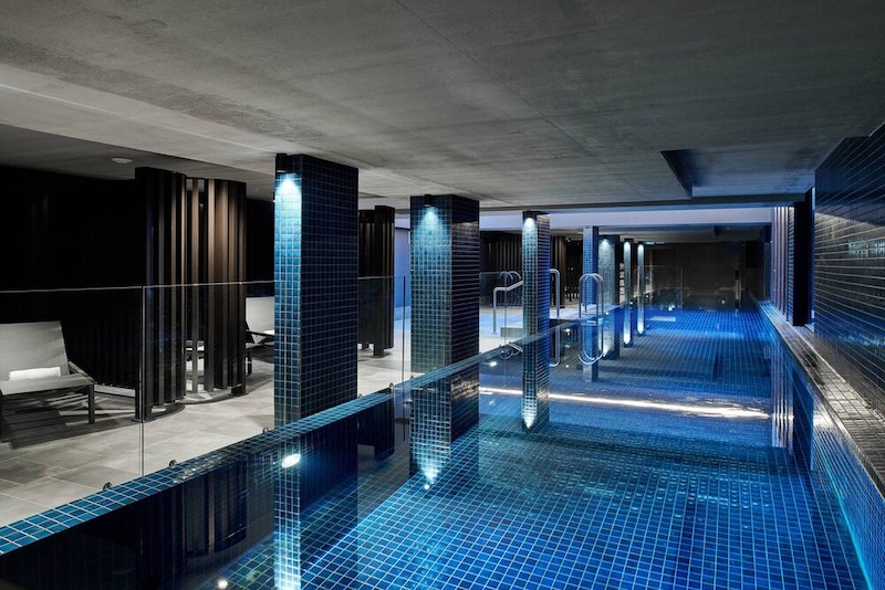Indoor lap pool at the Midnight Hotel, Autograph Collection, Braddon ACT. The tiles are midnight blue.