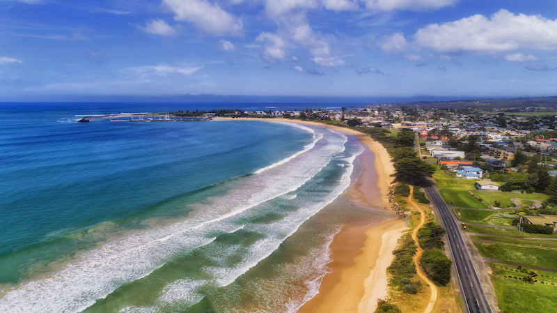 Aerial shot of the coastline along Apollo Bay, Victoria, Australia.