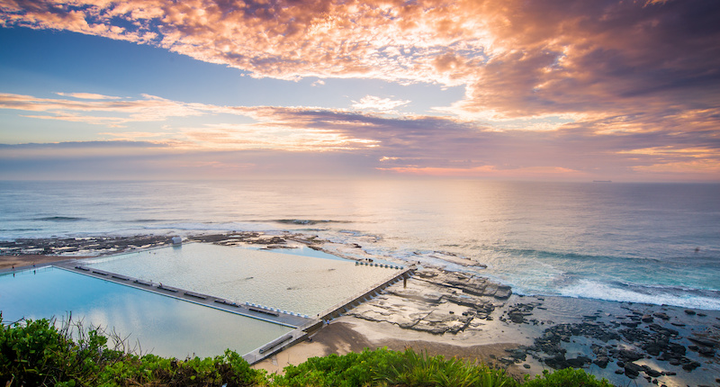 Sunrise over the Merewether Baths in Newcastle, NSW, Australia.