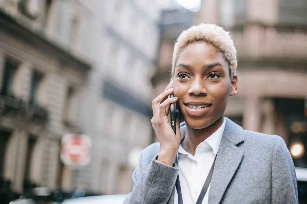 black woman on the phone