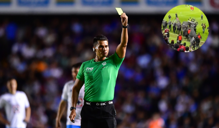 El árbitro Guillermo Pacheco salió escoltado de la cancha del Nemesio Diez. Foto: Mexsport