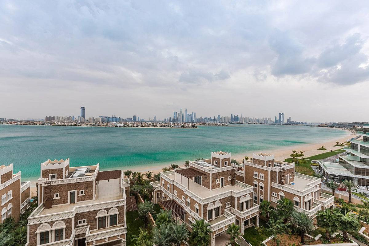 Part of the Balqis Residence complex sits along the shoreline 