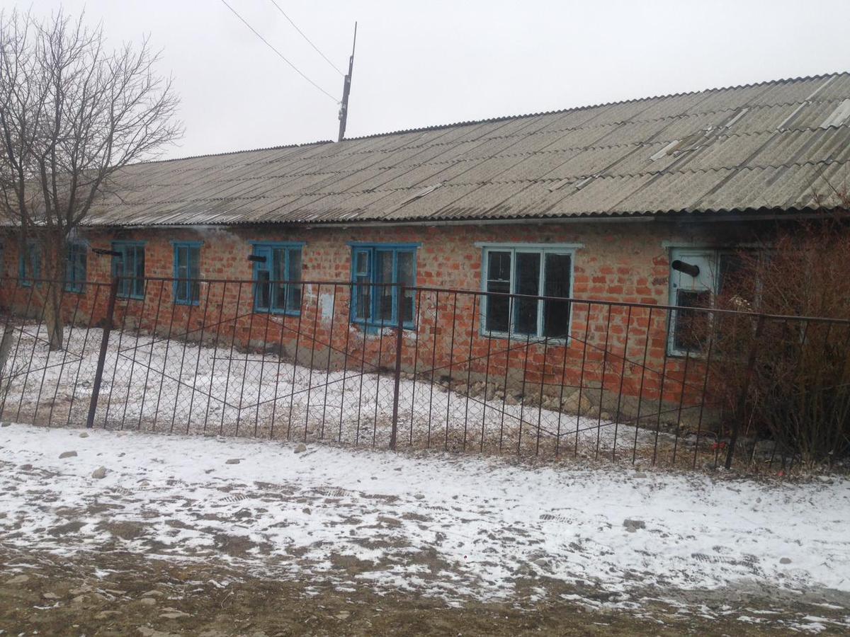 With no chimneys, stove pipes have to be extended out the windows