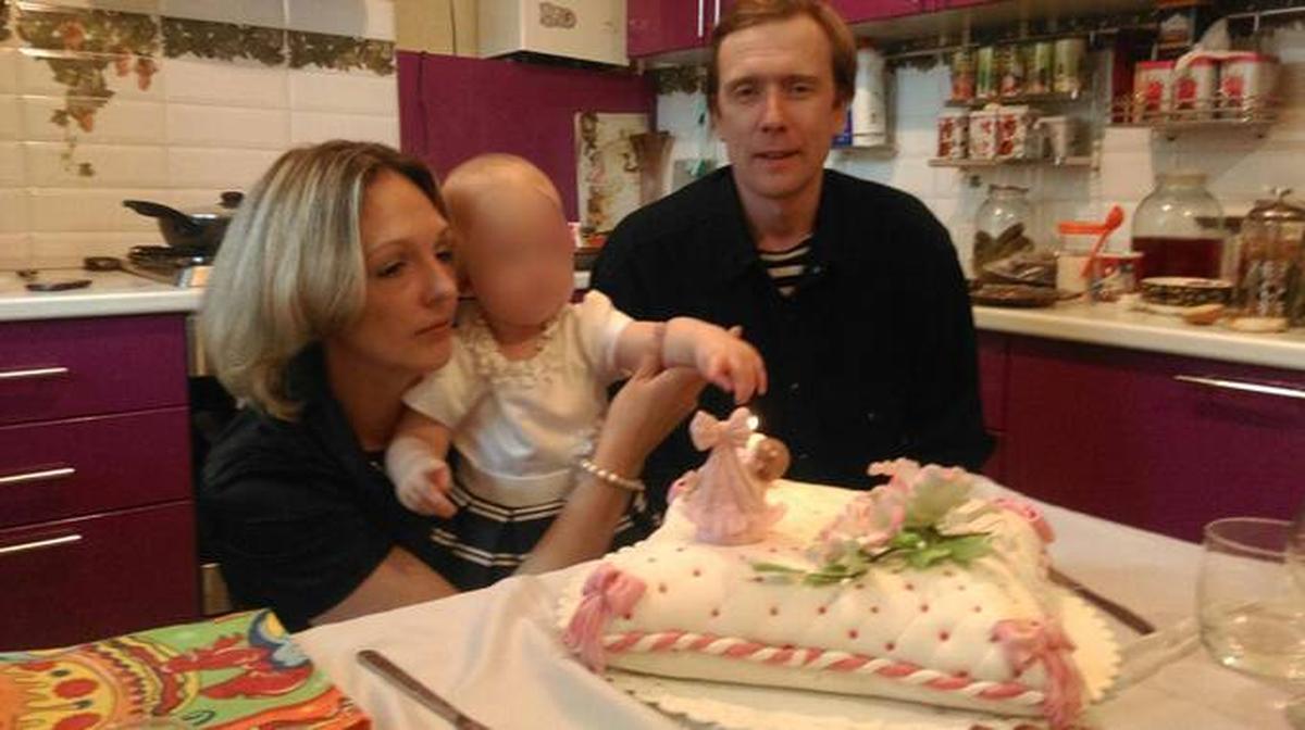 Nikolai Surnov with his wife and daughter