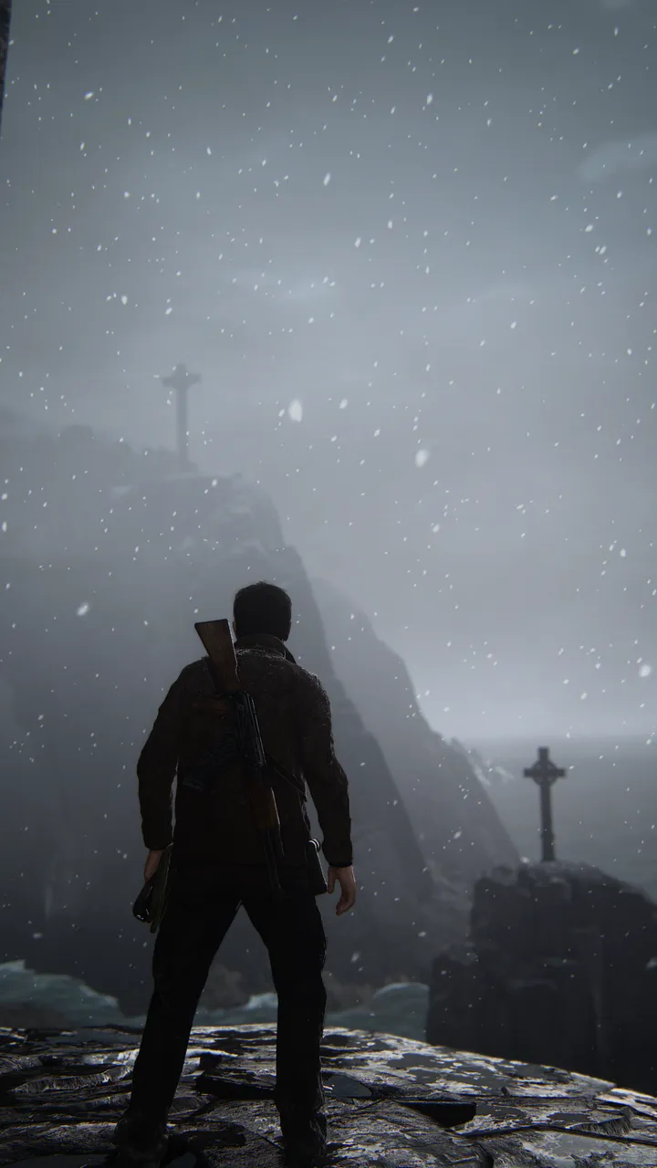 Nathan Drake stood on a cliffside