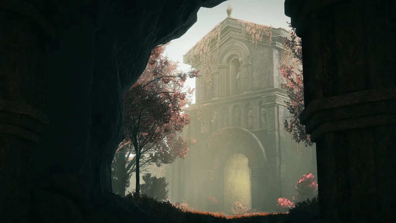Church like building being shown on the other side of a cave