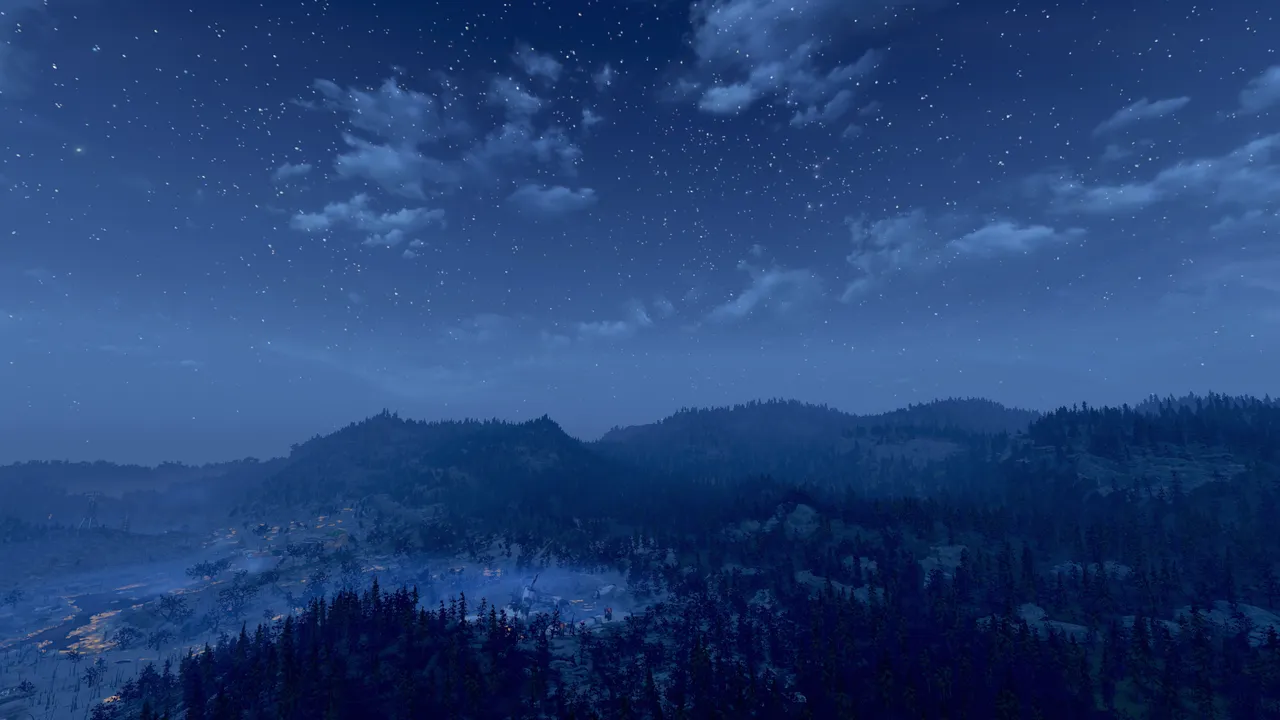 A cool, blue landscape of the Appalachia hills under the night sky