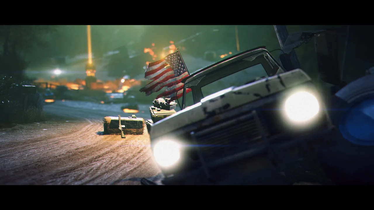 Pickup truck out of focus in front of a tattered American flag, burning scenery and a rifle leaning on a straw bale.