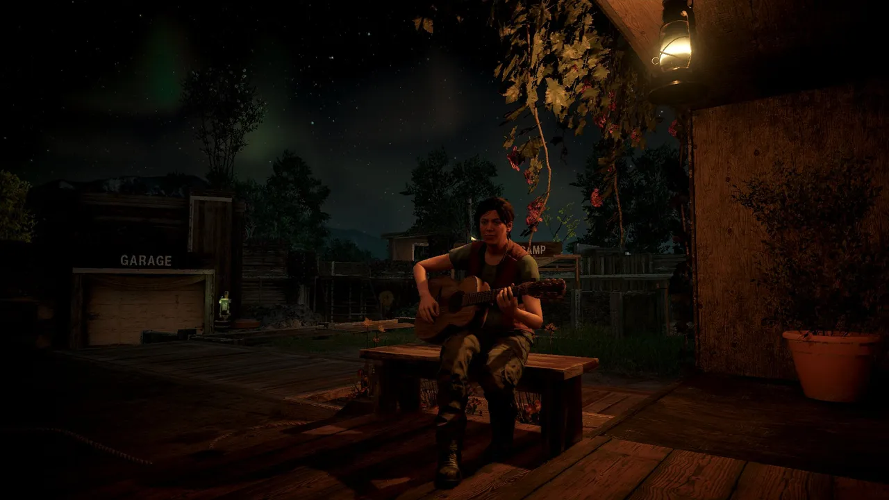 Playing the guitar underneath a night sky