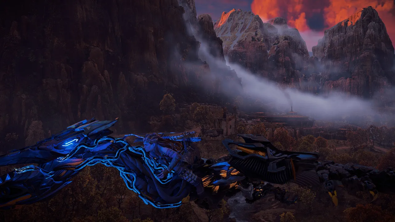 Aloy flying out of Chainscrape during sunset