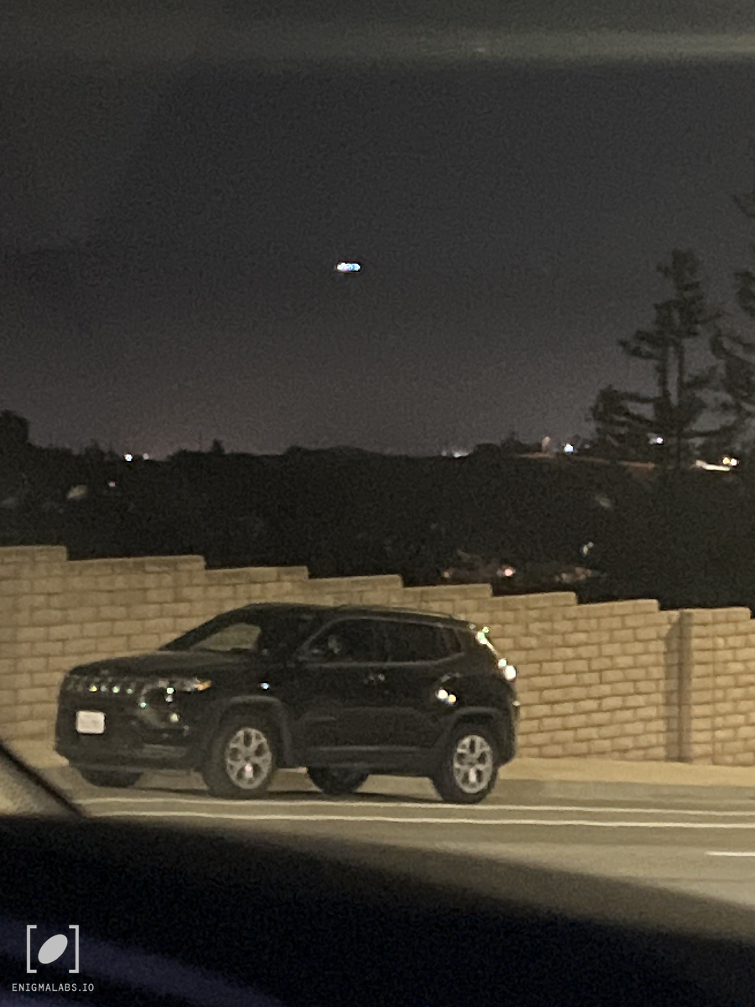 Large pulsing white lights moving side to side
